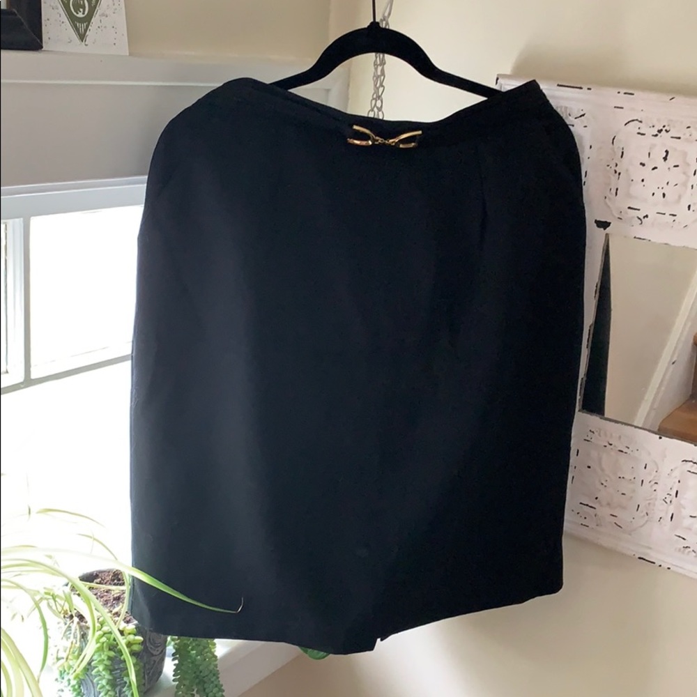 Vintage black skirt with gold buckle!